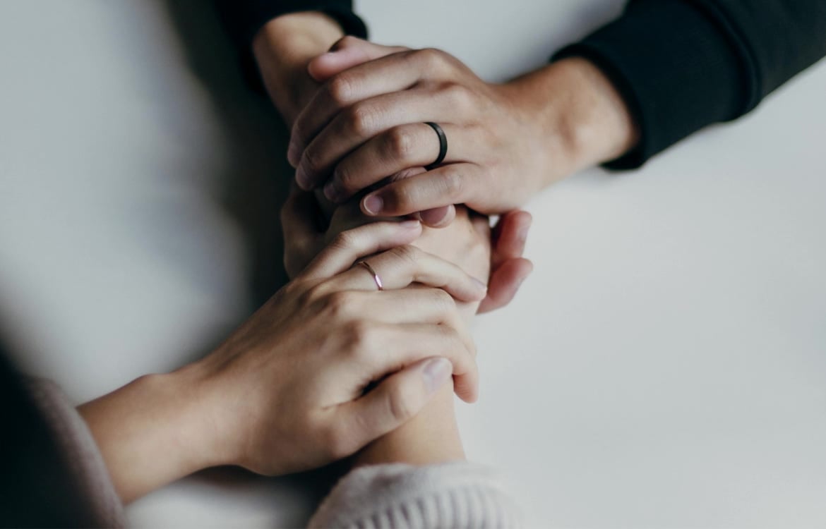 mental-health-care-holding-hands-thumb